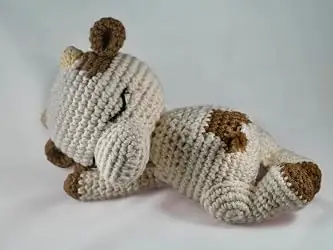 Sleeping crochet cow made from the library
