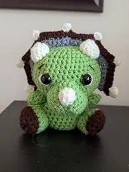 Crochet triceratops made from the library